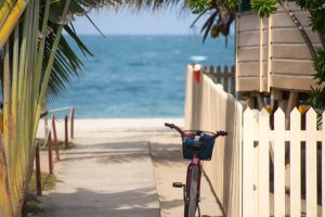 A bicycle parked beside a Florida beach house